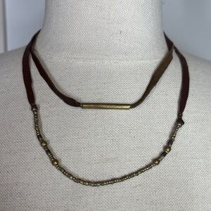 Two leather cord adjustable necklace with gold, copper beads